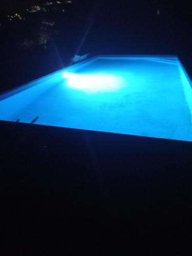 a blue stage with a light on it at night at Casa de silvares - Rústica in Celorico de Basto