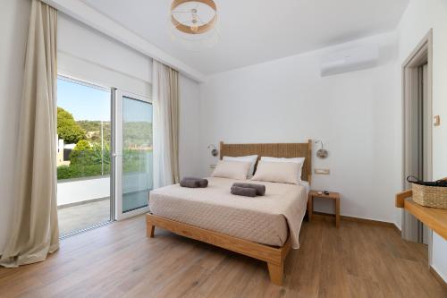 Postel nebo postele na pokoji v ubytování Villa Dana
