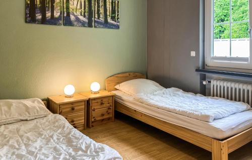 Katil atau katil-katil dalam bilik di 3 Bedroom Amazing Home In Fleringen