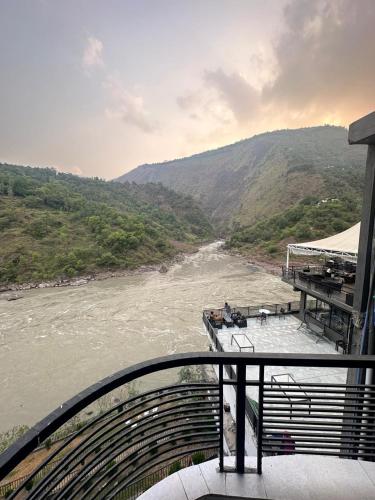 a view of a river from a boat at Hotel La Orilla Muzaffarabad in Muzaffarabad