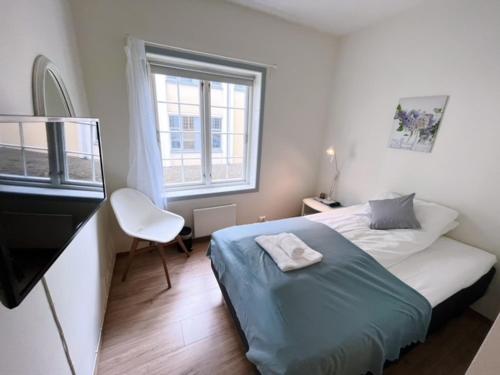 Postel nebo postele na pokoji v ubytování Verkshotellet Jørpeland