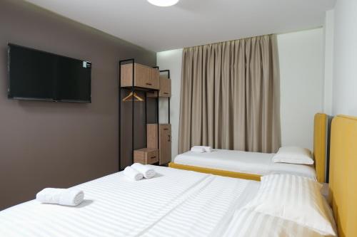 Postel nebo postele na pokoji v ubytování Comfort Rooms Pogradec