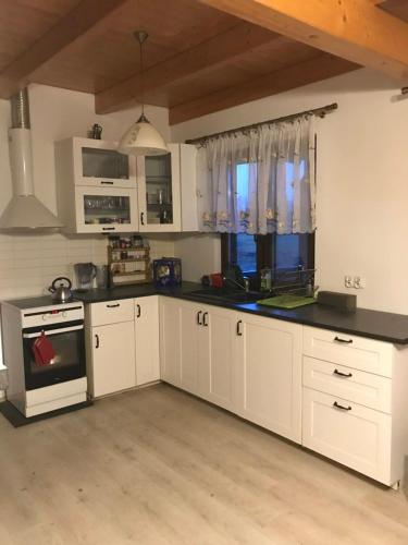 Dapur atau dapur kecil di Domek nad jeziorem w Świekatowie