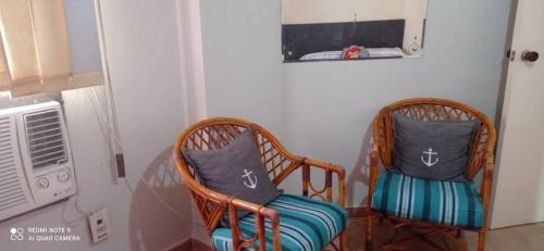 Televisyen dan/atau pusat hiburan di Apartamento - Flamingo Suites