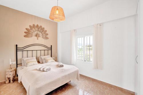 Ένα ή περισσότερα κρεβάτια σε δωμάτιο στο Seaview Apartment Beachlove Les Deveses Denia