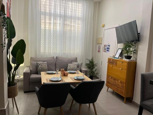 TV a/nebo společenská místnost v ubytování Viento FreshApartments