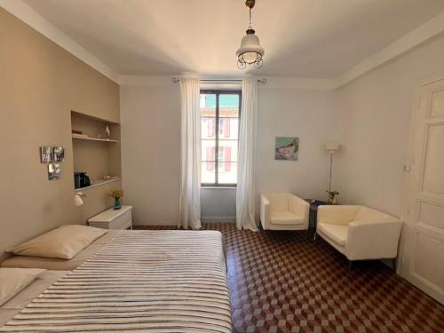 Ένα ή περισσότερα κρεβάτια σε δωμάτιο στο La Souche Chambres et Table d'Hôtes