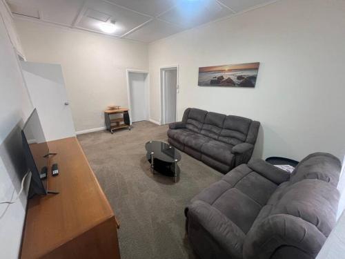 Μια τηλεόραση ή/και κέντρο ψυχαγωγίας στο North Parade Accommodation