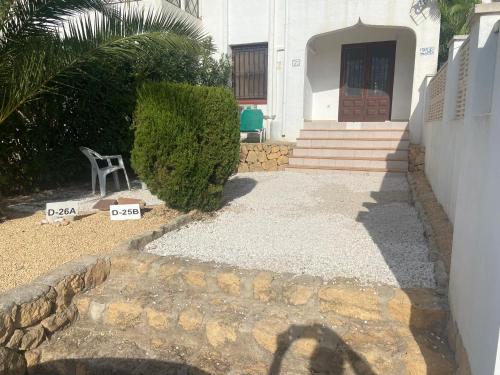 Apartamento con jardín, piscina y parking