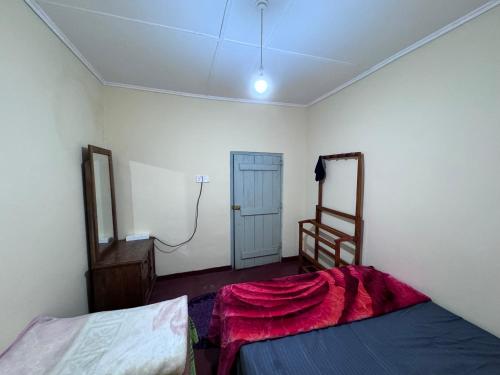 Postel nebo postele na pokoji v ubytování Trinity Guest-Inn
