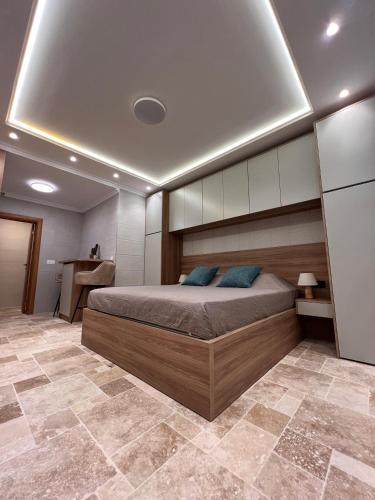 a bedroom with a large bed in a room at Casa Calma in Bar