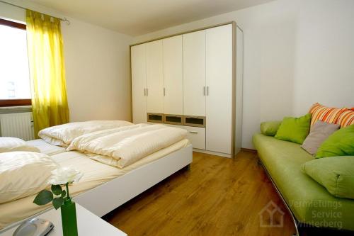 Cama ou camas em um quarto em Winternest