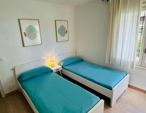 Ένα ή περισσότερα κρεβάτια σε δωμάτιο στο Illa 76