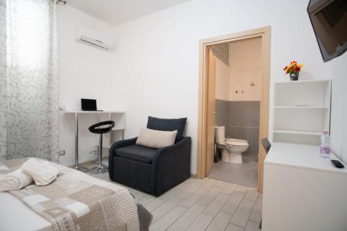 TV a/nebo společenská místnost v ubytování B&B ARCHIMEDE
