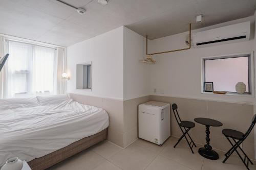 The Phase Boutique Hotel 동대문にあるベッド