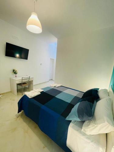 Postel nebo postele na pokoji v ubytování Guest House La Corte