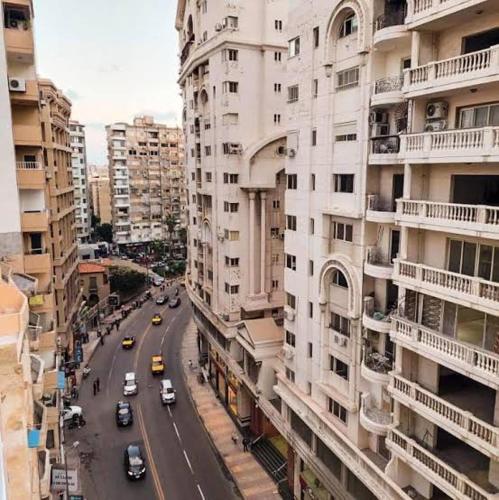 a view of a city street with cars and buildings at شقق فاخرة للطلبة و الاسر in Alexandria