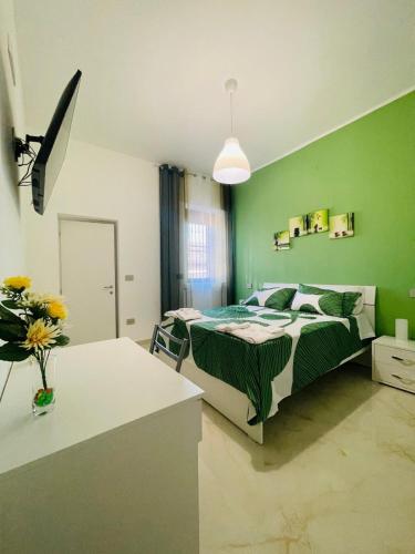 Postel nebo postele na pokoji v ubytování Guest House La Corte