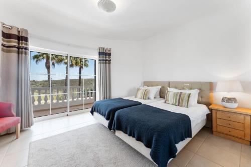 Ένα ή περισσότερα κρεβάτια σε δωμάτιο στο Villa Speranze