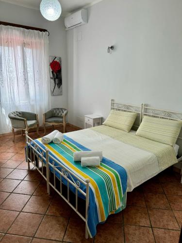 Ένα ή περισσότερα κρεβάτια σε δωμάτιο στο Agriturismo Le Macine-Poggio Cono