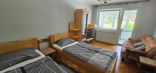 Postel nebo postele na pokoji v ubytování Apartment Milan