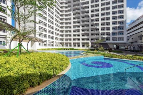 Spacious condo with pool view at Grace Residences, near BGC