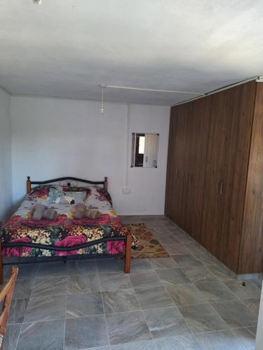 Postel nebo postele na pokoji v ubytování Το Κονάτζι