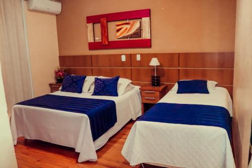 Ένα ή περισσότερα κρεβάτια σε δωμάτιο στο Hotel Arlen 4