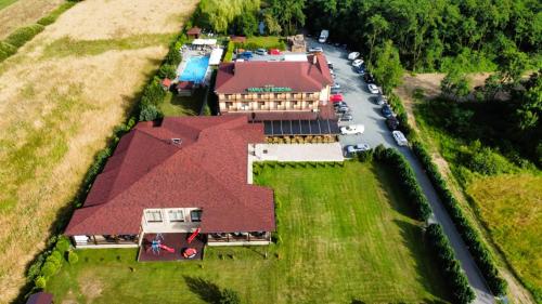 an aerial view of a house with a roof at Hanul Lui Bogdan Economy INN in Făget