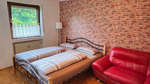Una cama o camas en una habitación de Föhren Apartment