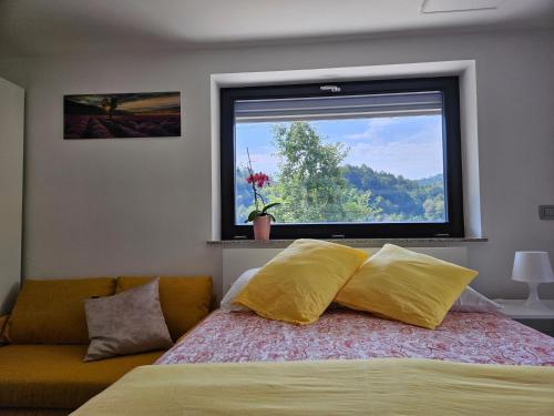 Postel nebo postele na pokoji v ubytování Apartmaji Rdeča Kapica