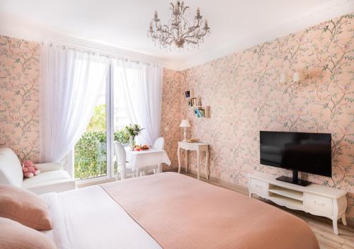 Televisyen dan/atau pusat hiburan di Cannes Imperial Croisette Palais Miramar