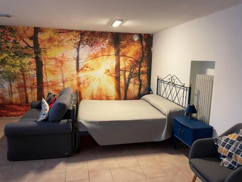Postel nebo postele na pokoji v ubytování Scorcio d autunno