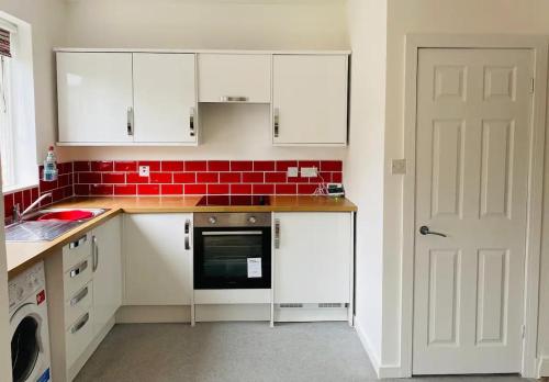 Dapur atau dapur kecil di Poppy's Coastal Retreat