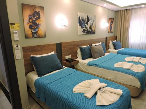 Katil atau katil-katil dalam bilik di Başar hotel