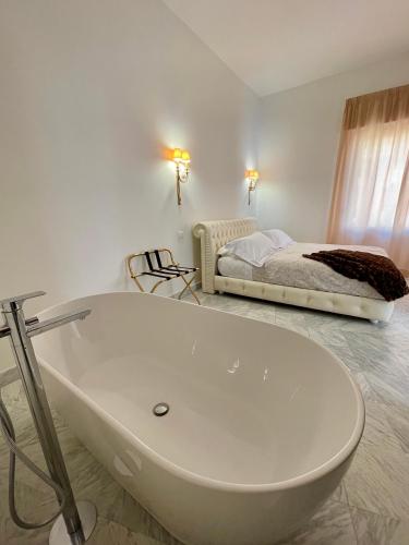Ένα ή περισσότερα κρεβάτια σε δωμάτιο στο Andrews Luxury Apartment