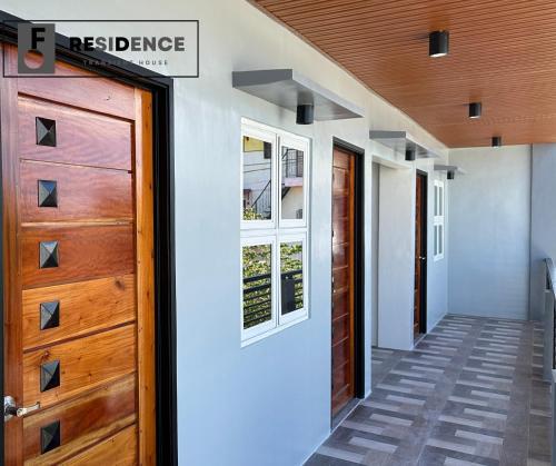 a front door of a house with a entrance at F Residence Transient House in Cabanatuan