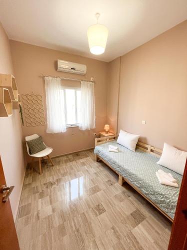 Ένα ή περισσότερα κρεβάτια σε δωμάτιο στο Room 4