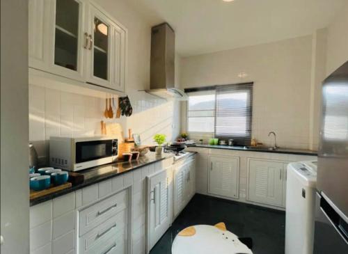 Køkken eller tekøkken på Paradise Village Heart of Hua Hin