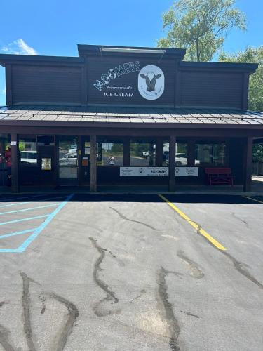 an empty parking lot in front of a building at LAKEFRONT PARADISE 4 bedroom Home w direct lake access, Pets OK in Traverse City