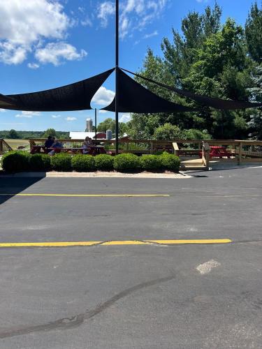 a parking lot with a black and white canopy at LAKEFRONT PARADISE 4 bedroom Home w direct lake access, Pets OK in Traverse City