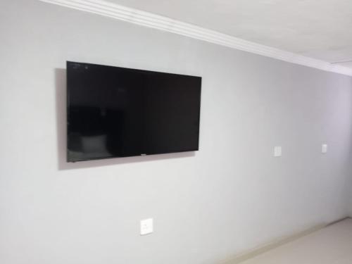 TV a/nebo společenská místnost v ubytování Machogeguestlodge