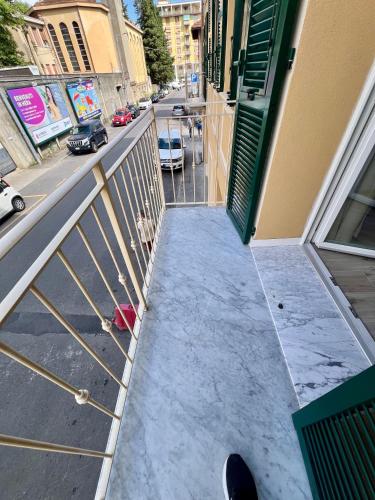 a view of a street from the balcony of a building at CINQUE TERRE Hub Suite ART in La Spezia