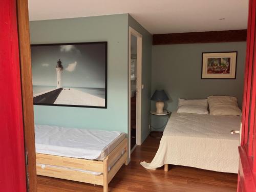 Photo de la galerie de l'établissement Maison familiale avec piscine proche du bassin à pied, à Andernos-les-Bains