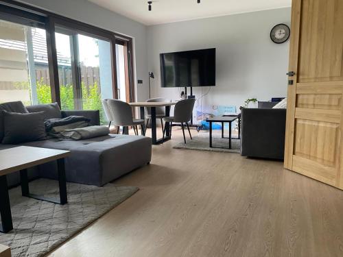 TV a/nebo společenská místnost v ubytování Arcadia Home