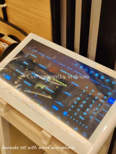 a tablet computer sitting on top of a chair at One Summerday in Desaru in Kangkar Chemaran