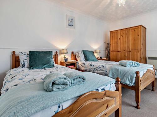 Voodi või voodid majutusasutuse 3 Bed in St Day 37014 toas