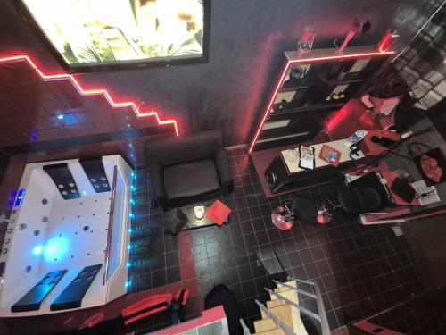 an overhead view of a bathroom with red and blue lights at Nouvelle Maison Relax in Leonforte