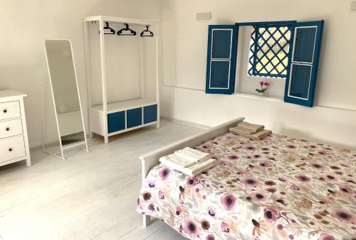 Кровать или кровати в номере La Mia Valigia a Stromboli