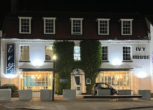 a building with a car parked in front of it at Ivy By The Sea in Scarborough